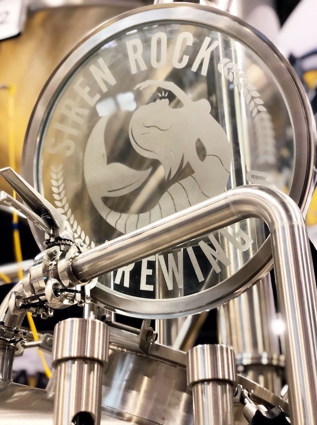 Sample fermentation tanks in a brewery